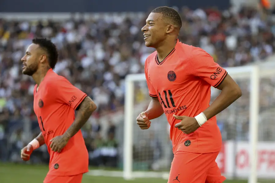 Download Stock Image of Neymar and Mbappe Staring Forward in Red Dress