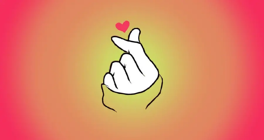 Attractive image of a heart with hands with an orange background for Windows 11 wallpaper