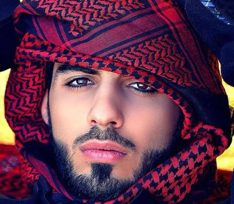 Photo of a Famous Arab Model with Black Eyes and Eyebrows and a Red Hijab 2022