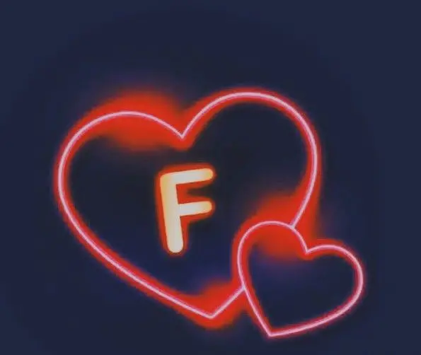 Download an interesting background image of the letter F inside a big heart and a small heart next to it