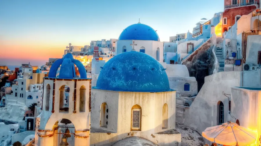 HD background of the magnificent church building among the houses of Santorini