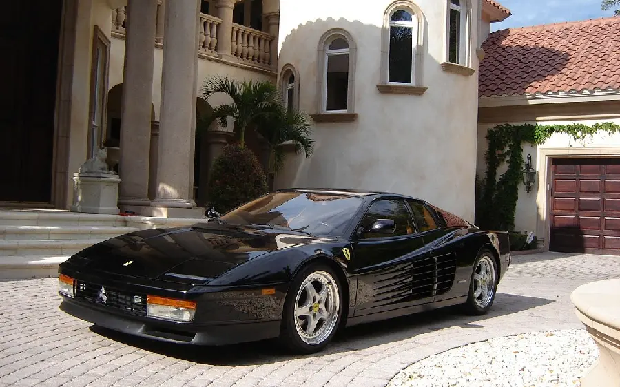 A super well-shaped black Ferrari in a beautiful frame
