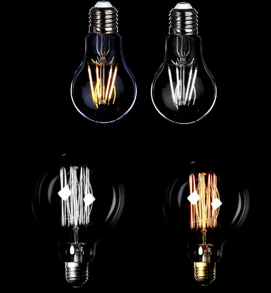Special stock photo of light bulbs on and off with a black background