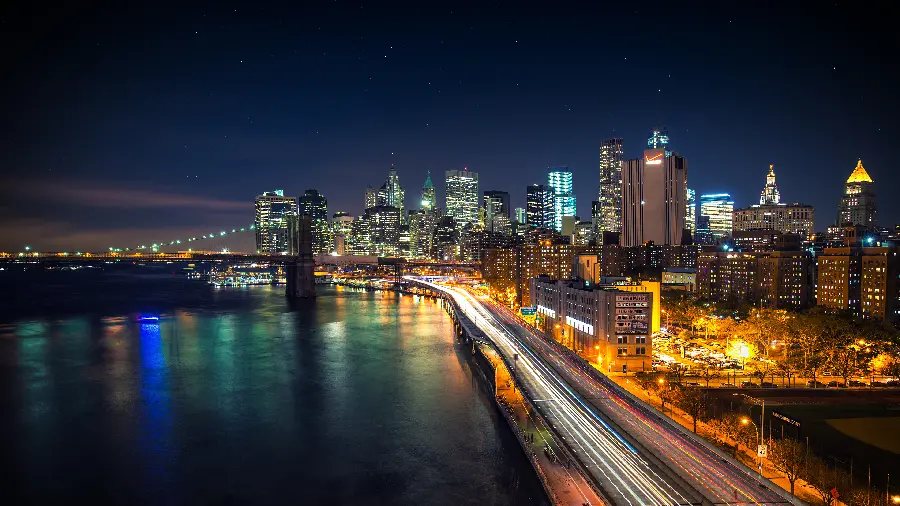 Stock image of buildings of different sizes and long urban bridges