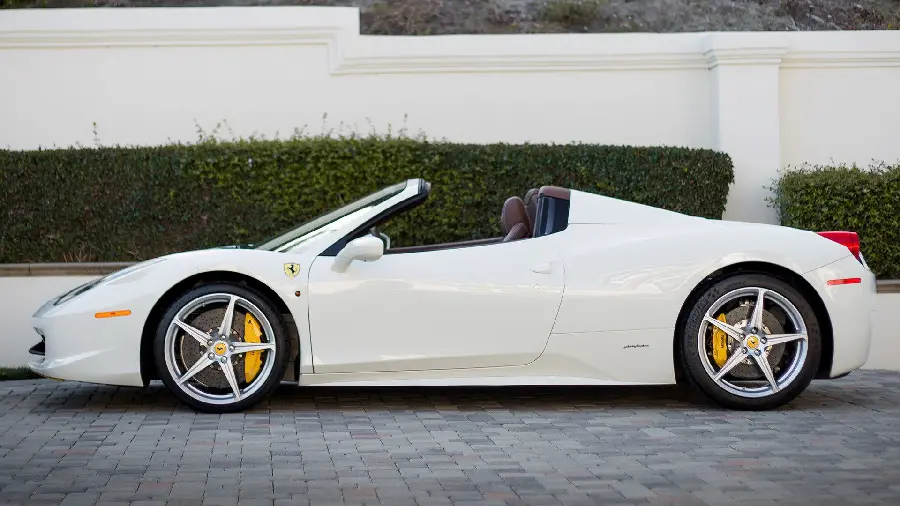High quality photo of expensive Ferrari 458 car in white color and from side view