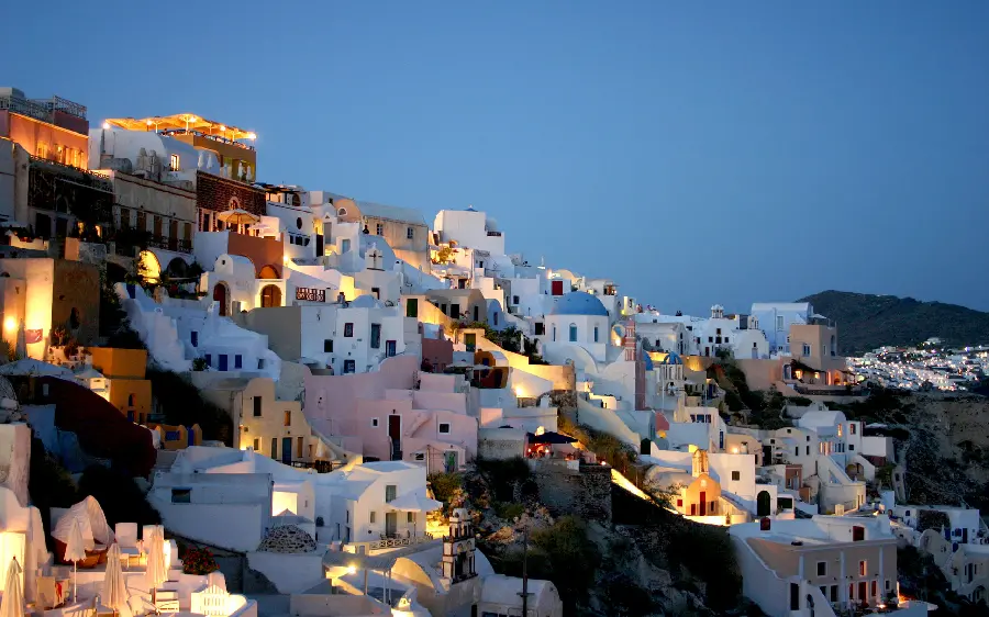 Dreamy Photo of a Sloping City with Shining White Houses
