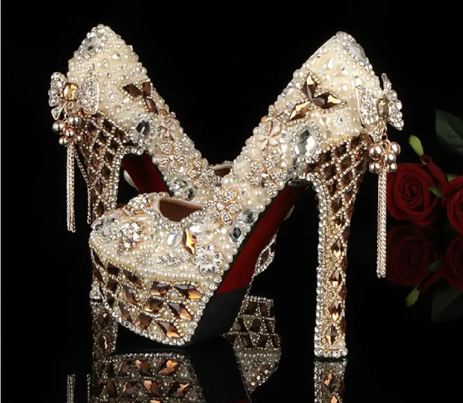 Download a luxurious profile photo of a royal high-heeled shoe with silver and diamond decoration