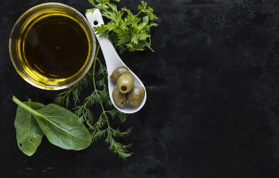 Free download of olive oil photo with black background for making advertising text photos in HD quality 