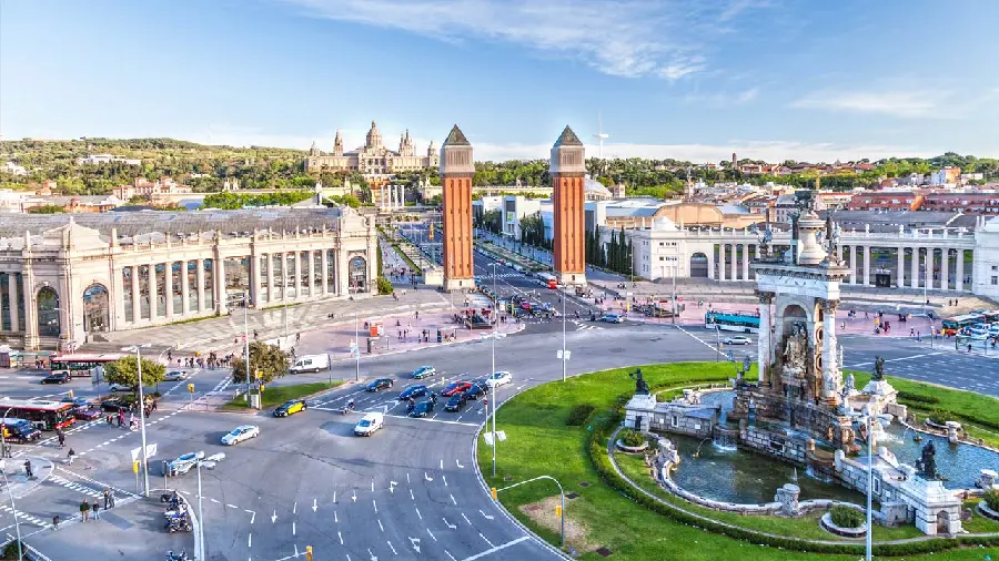 Download a background image of the largest square in Barcelona and its magical fountain, special for iPhone