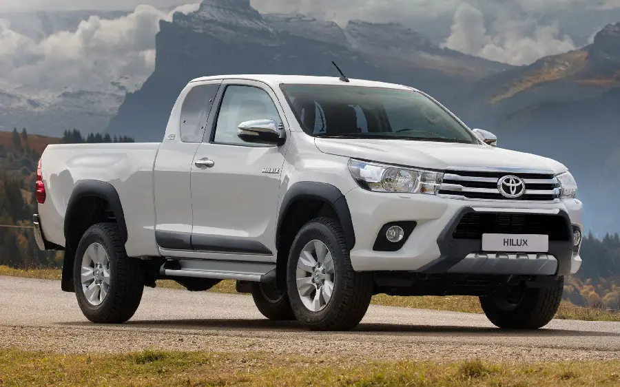 The hottest background of the popular Toyota Hilux with a mountain view