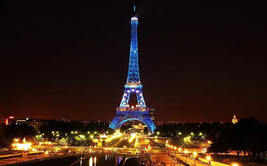 Amazing background for the computer of the Eiffel Tower with blue light in Paris, high quality