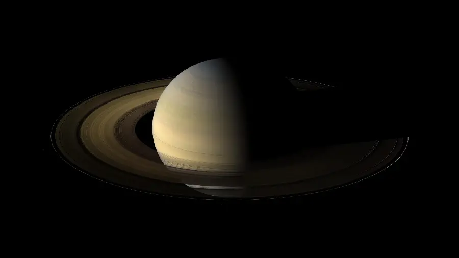 Beautiful 8K wallpaper of Saturn with two dark and light halves