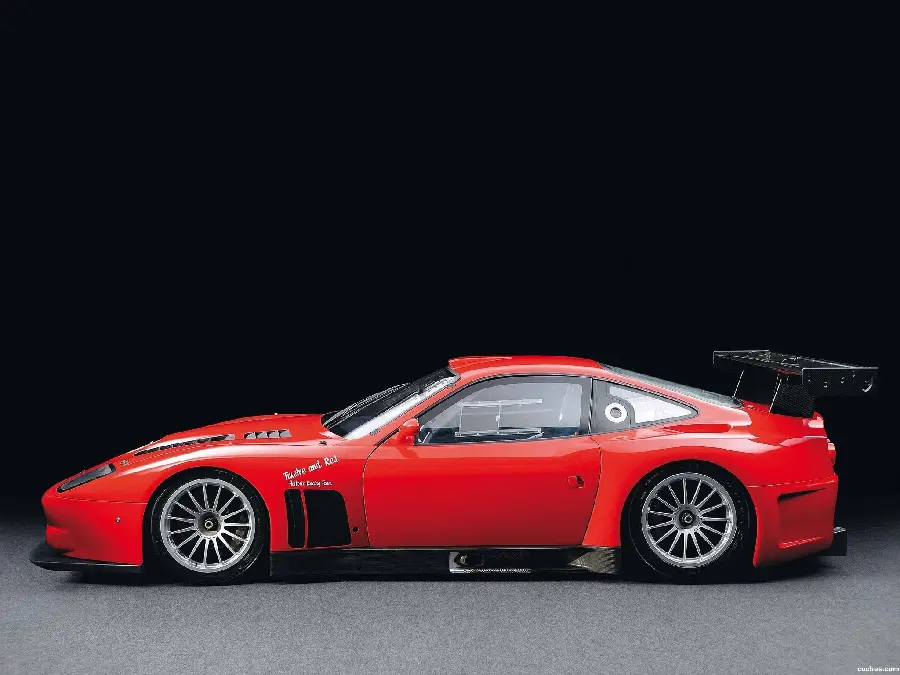 Download a trendy photo of an old and classic Ferrari on a black background from the left side in high quality hd