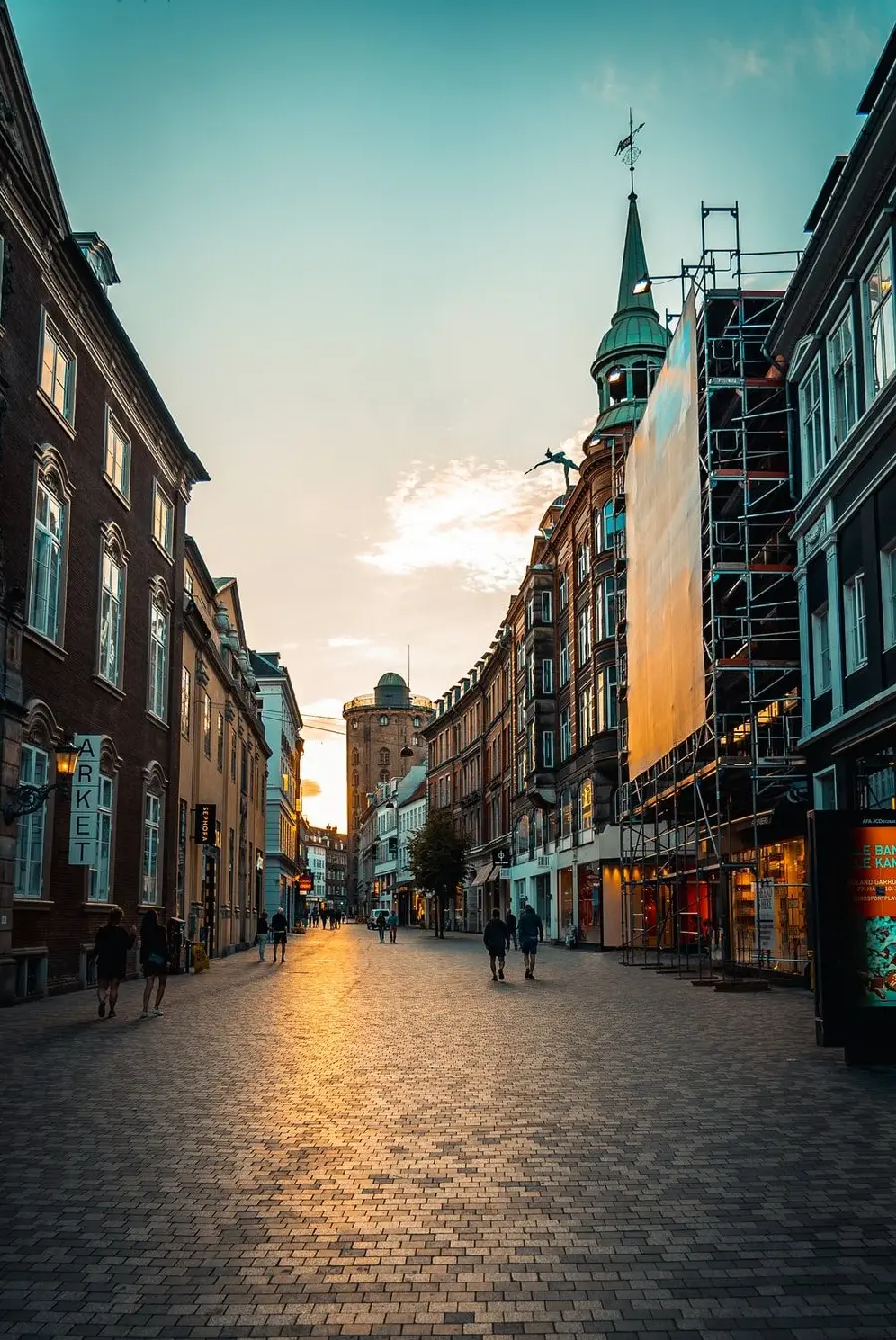 Download popular and bright background image on the road Brick-shaped city with a church and other places and passers-by
