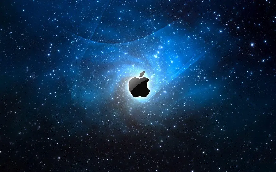 Beautiful Dreamy Image of a Starry Sky with a Blue Glowing Night and the black bitten apple inside it