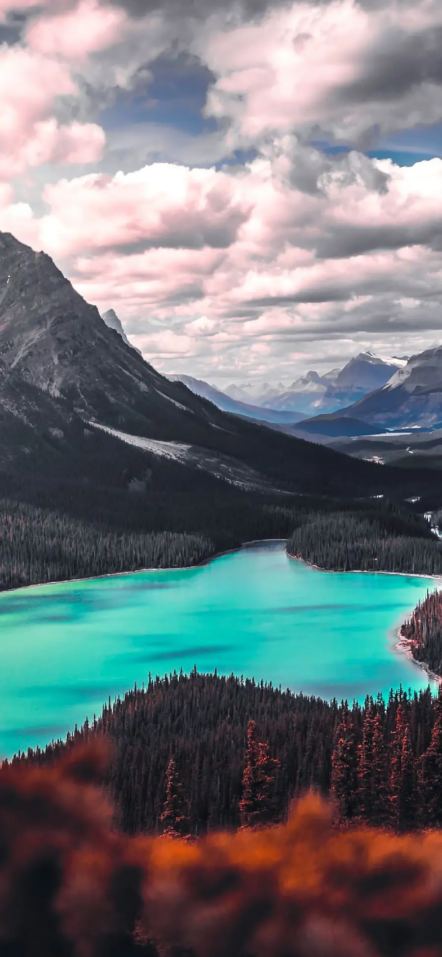 Download a special stock image for Android phones of nature with cloudy skies, towering mountains and rivers