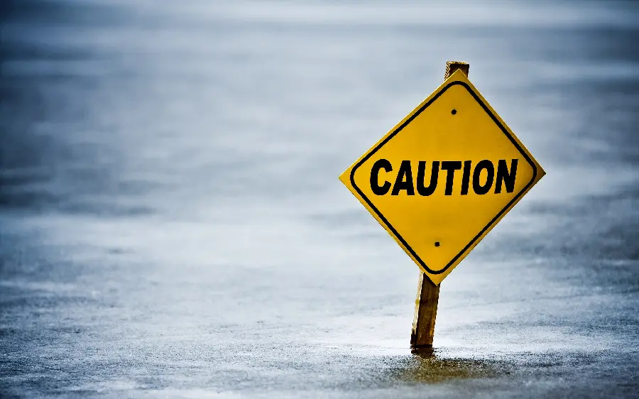 Small and Daunting Yellow Danger Sign in an Art Frame 
