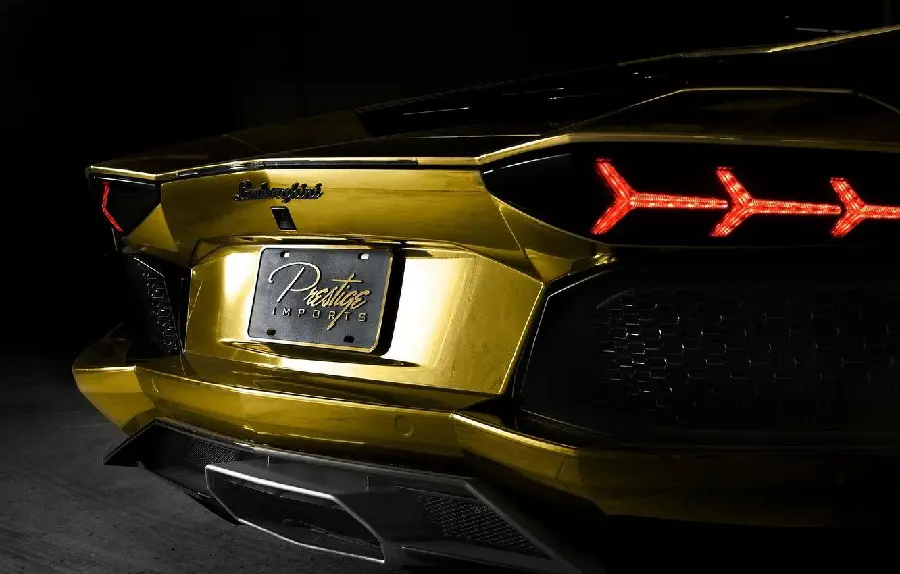 Download an incredibly beautiful artistic photo of a golden Lamborghini from up close