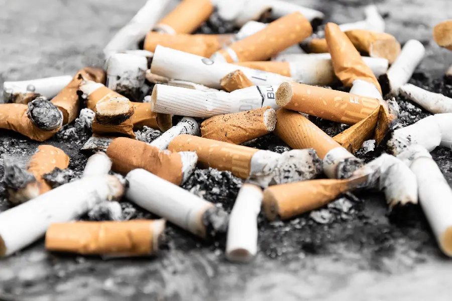 Instagram profile photo of two-tone smoked cigarettes