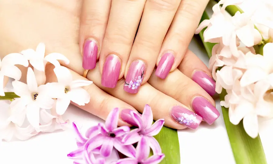 Spectacular Girls' Nail Model with Bright Purple Nail Polish Suitable for Birthdays