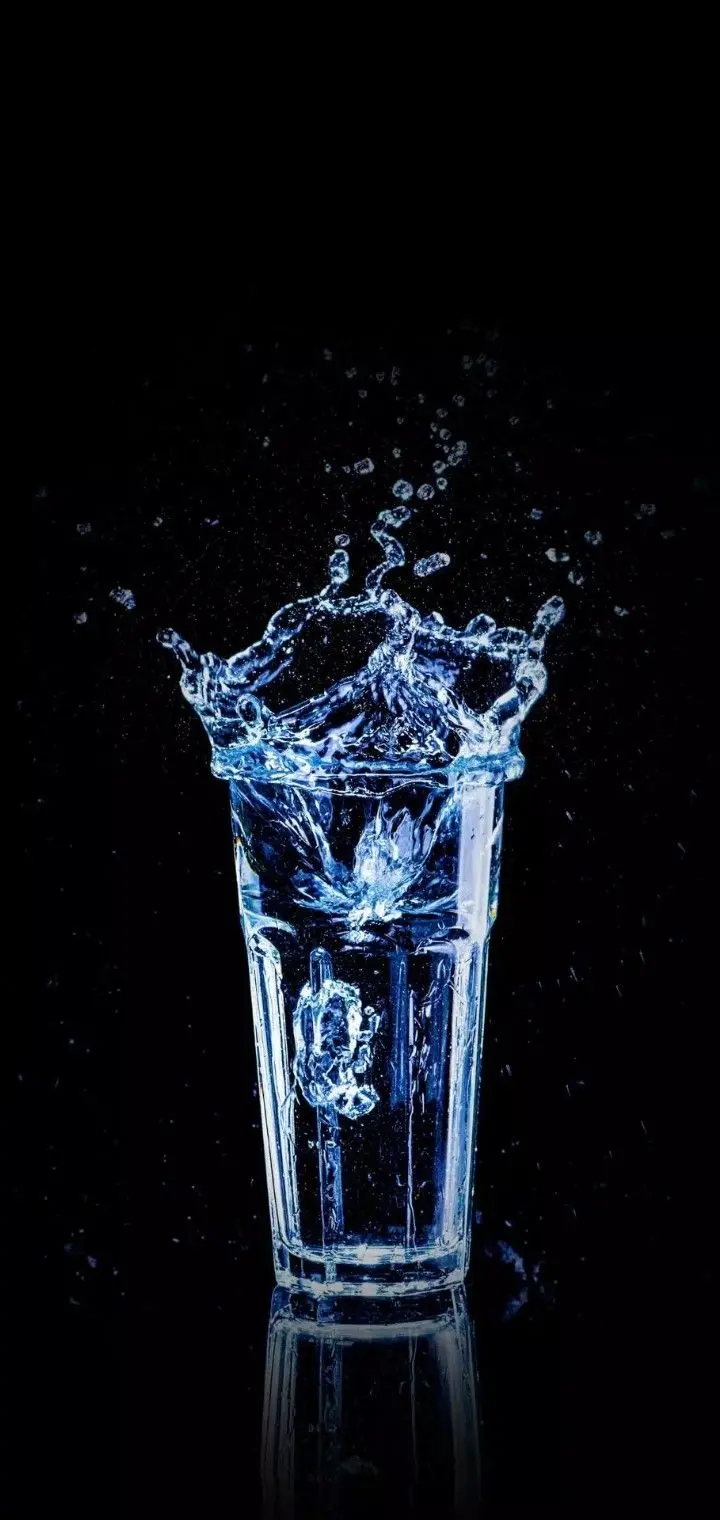 Download Popular Background Water in Glass Cup with Black Background