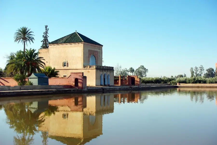 Dreamy photo of the garden of the Moroccan minaret from the side near the lake