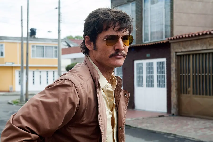 Photo of Pedro Pascal with a jacket and Interesting glasses in the movie makeup
