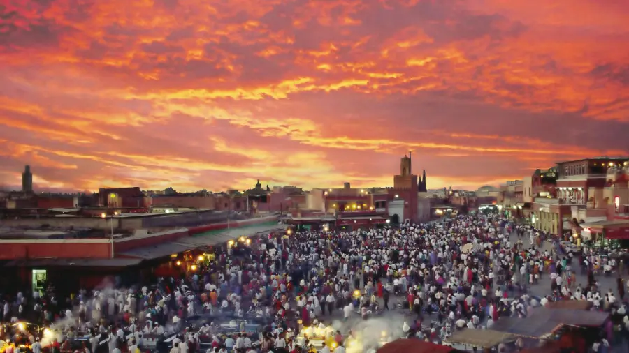 Picture of Moroccan people in the city under a beautiful sunset sky