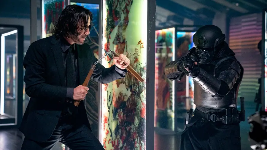 Cool photo of Keanu Reeves with Nunchiko in the movie John Wick 4