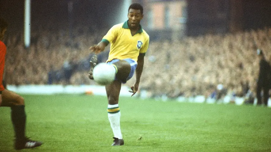 Picture of the moment Pele, a Brazilian player, shoots in the World Cup