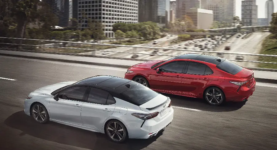 Photo of Toyota Camry with attractive two-tone white and red 