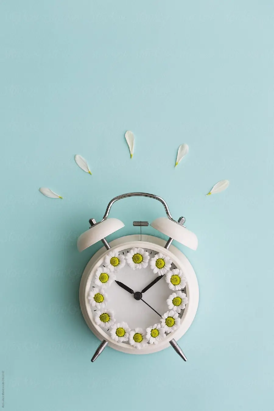 Energetic photo of clock with blue and white theme for background