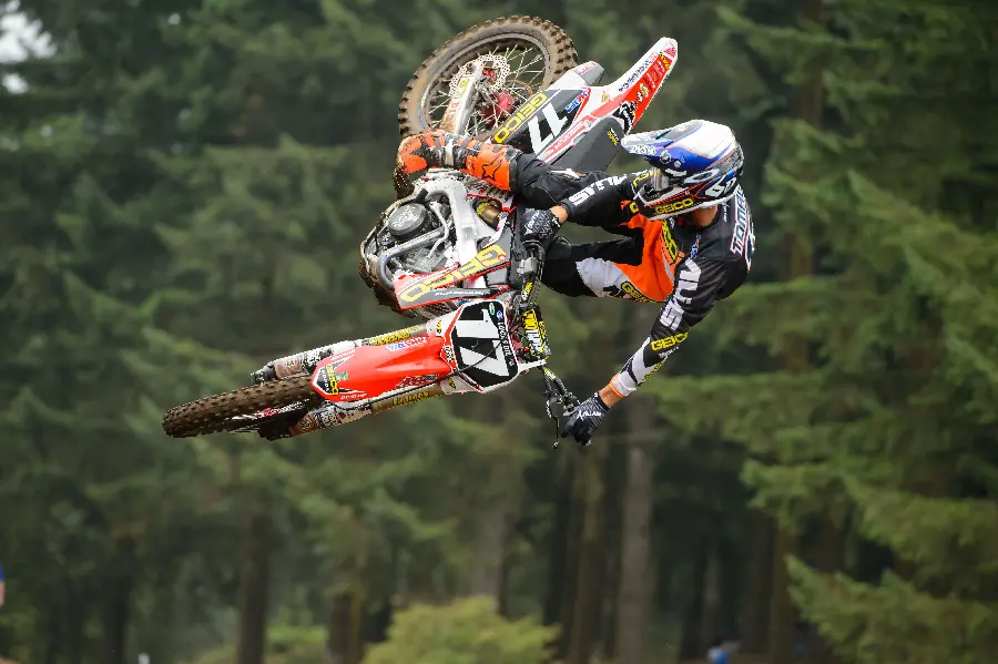 Cool wallpaper of stunts with a motorcycle trail