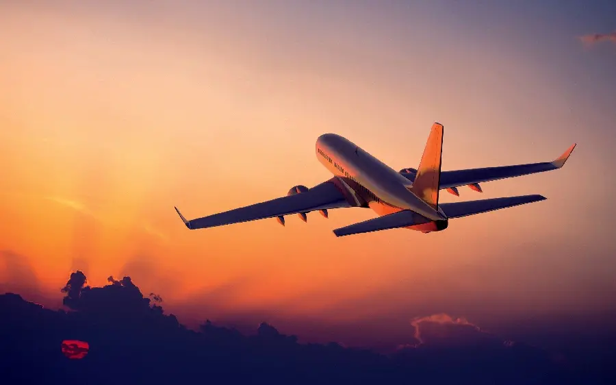 Background of a plane at sunset