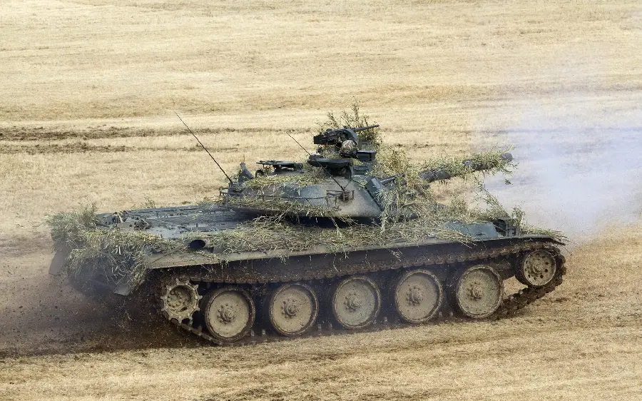 Awesome poster of a battle tank camouflaged in nature 