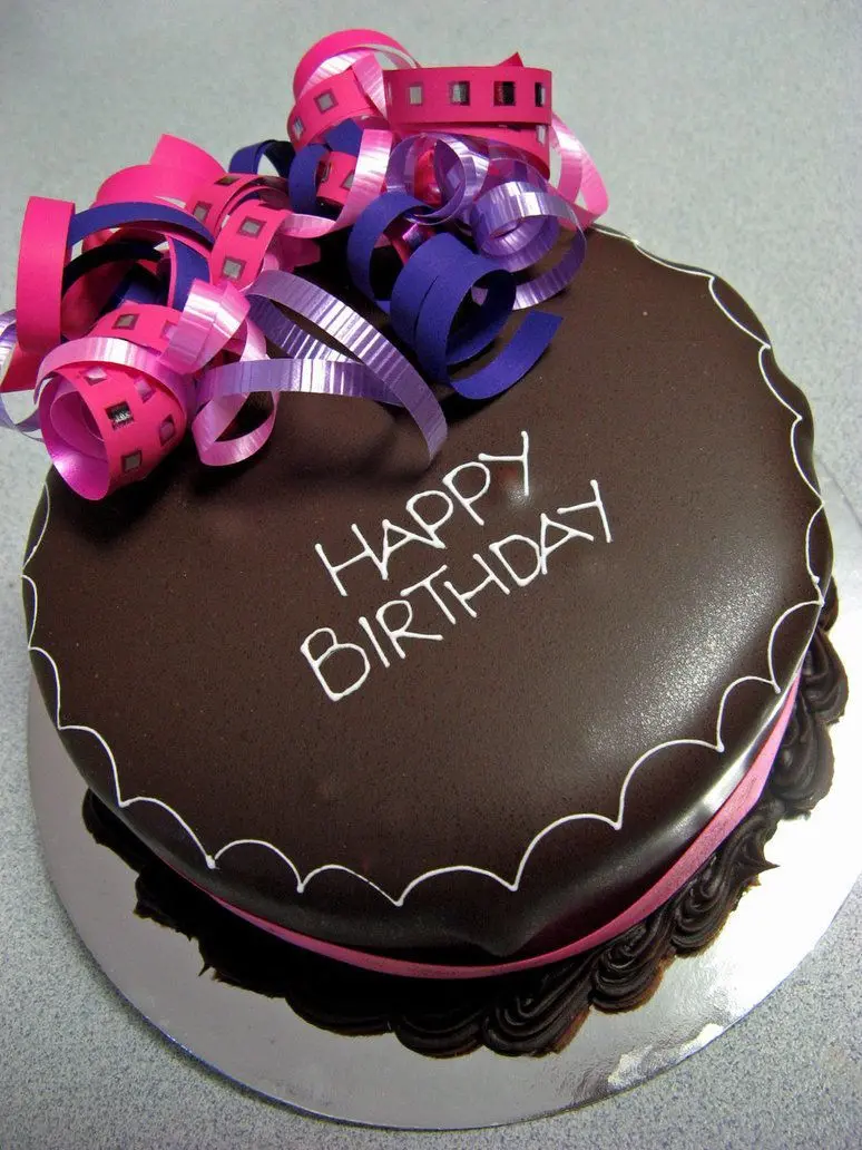 A delicious cocoa birthday cake stock photo with the caption Happy Birthday