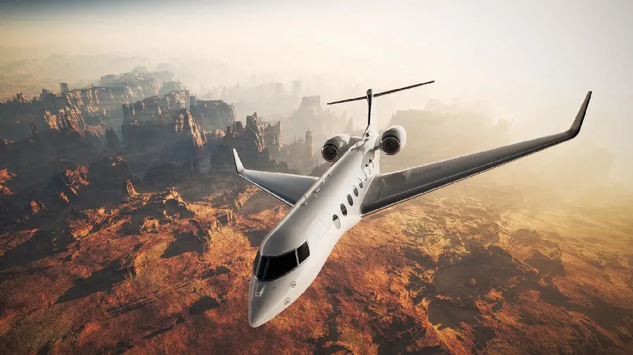 Photo of a private plane over the mountains