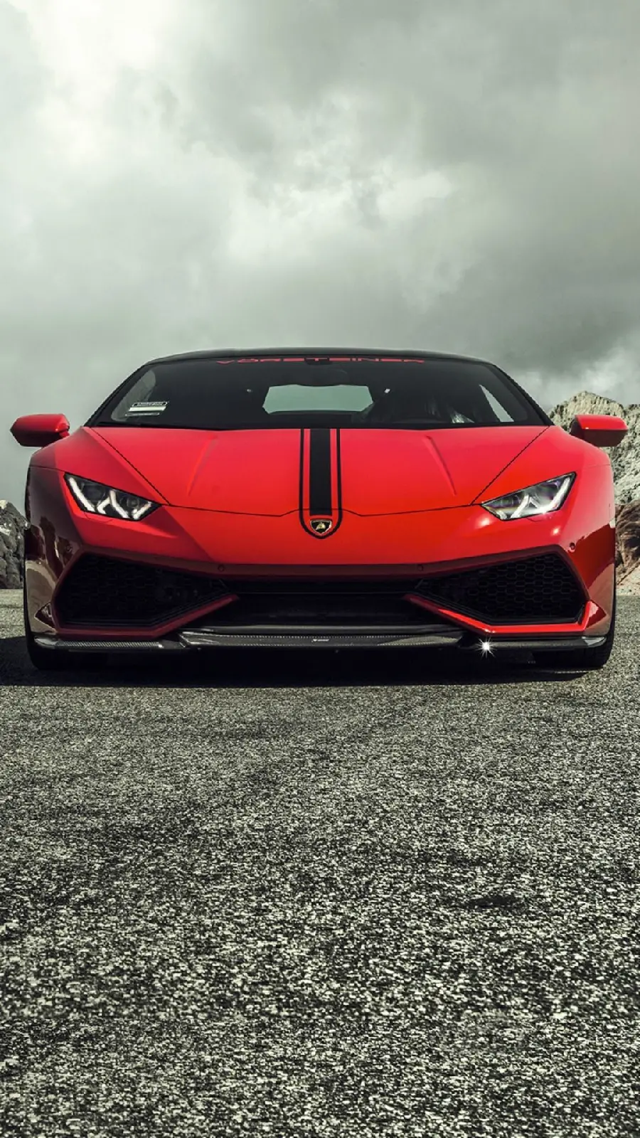 Interesting and spectacular image of a cool red foreign car on the road