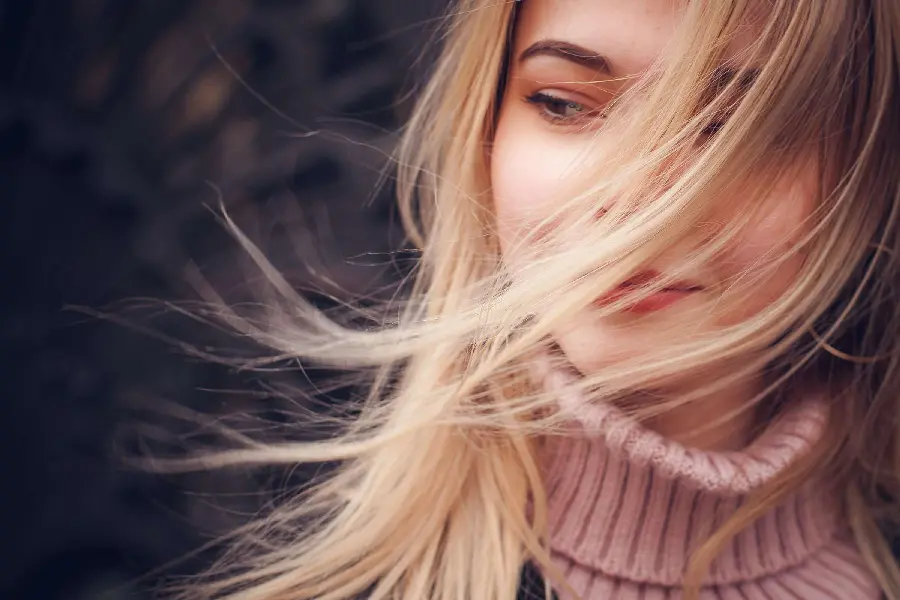 Beautiful and lovely girl's hair in the wind for background