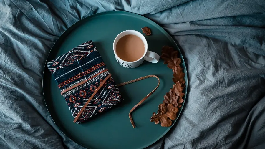 Special profile photo of a coffee cup and a book with 8K quality