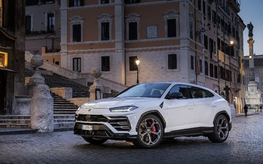 White Lamborghini Urus SUV On The Side Of The Street