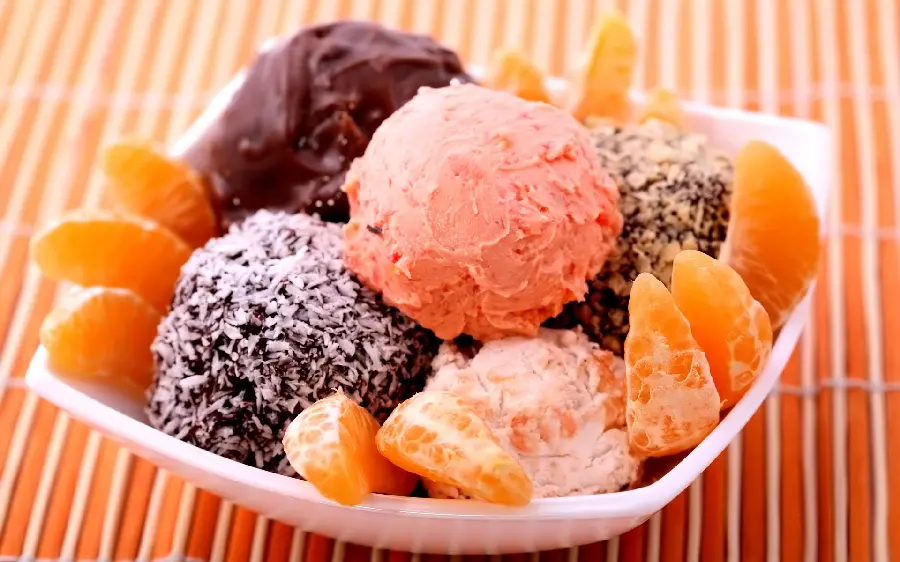 Very nutritious cool snack containing various fruits and ice cream
