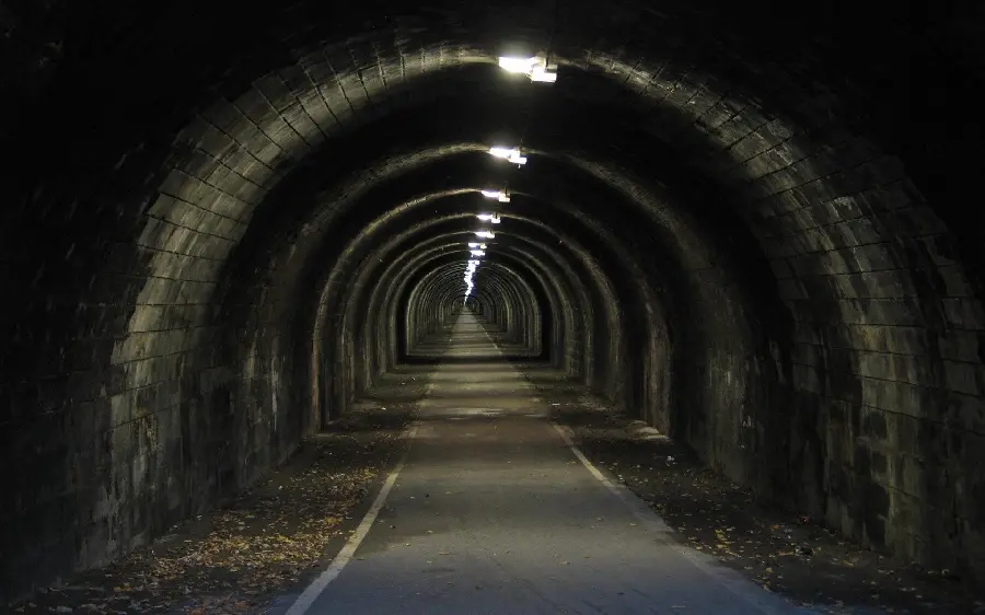 Scary and mysterious profile photo with 8K design of a dark tunnel