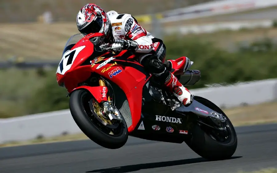 Red Racing Motorcycle Acceleration Photo
