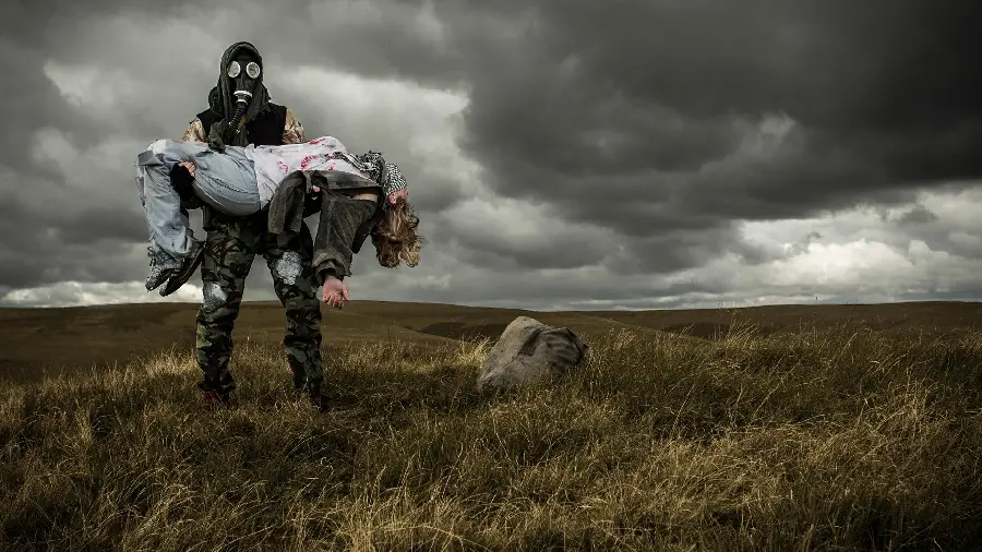 Image of Man Rescued by Soldier in Smoke Mask