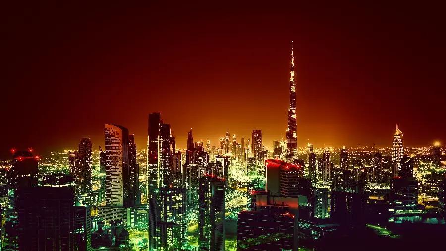8K Stock Photo of Dubai at Night with a Beautiful Green and Orange Theme