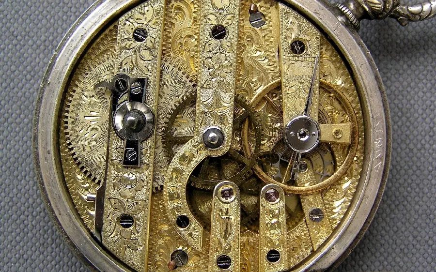 Photo The most expensive antique wall clock with spectacular gold plating 
