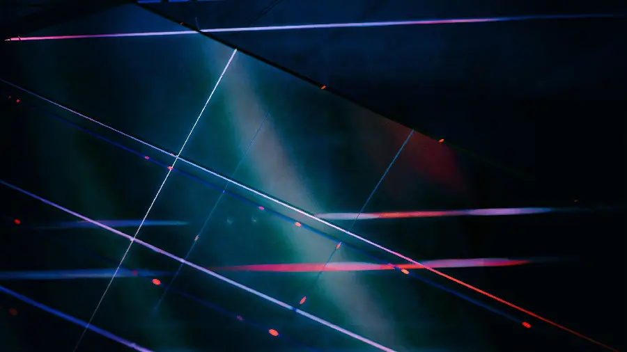 A masterpiece of colored laser reflections in glass on a black background