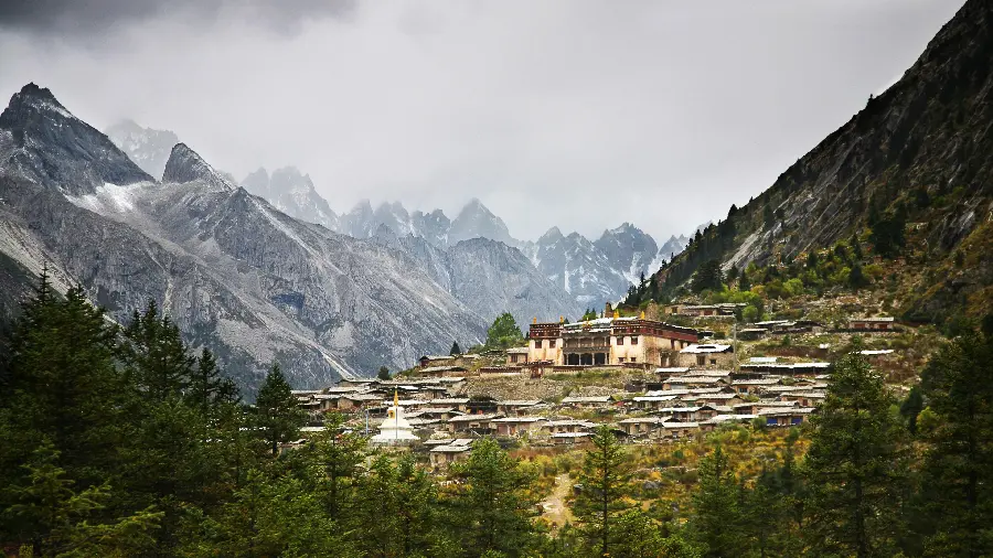 Picture of an old masterpiece temple in Tibet in a spectacular green village