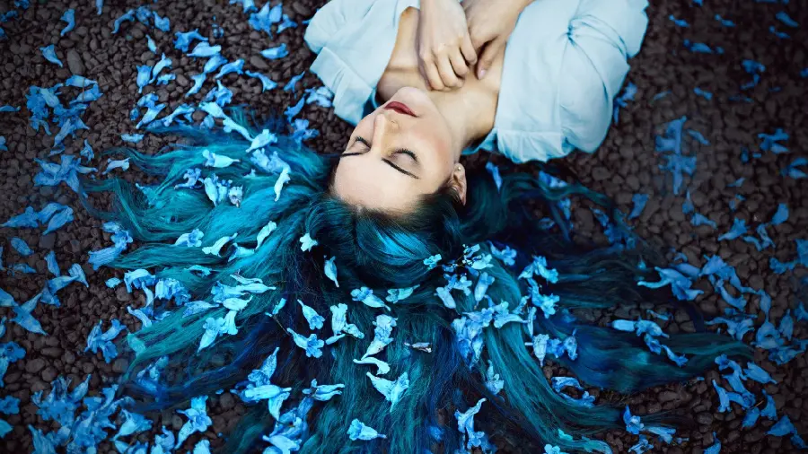 OS X girly wallpaper with a beautiful blue haired girl